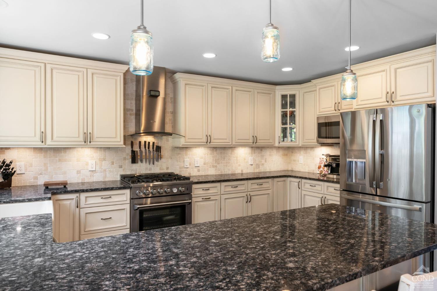 174 Grove School Road Catskill, NY 12414 - Photo 9 of 52 a kitchen with stainless steel appliances granite countertop a stove a sink and a refrigerator