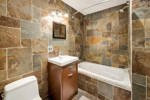 a utility room with washer and dryer