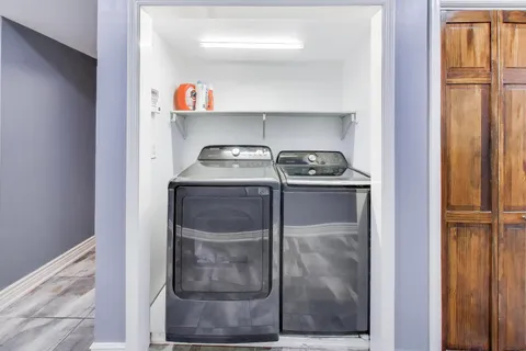 a picture of a bench in front of a window