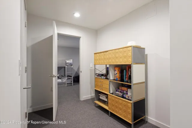 a view of front door and bedroom