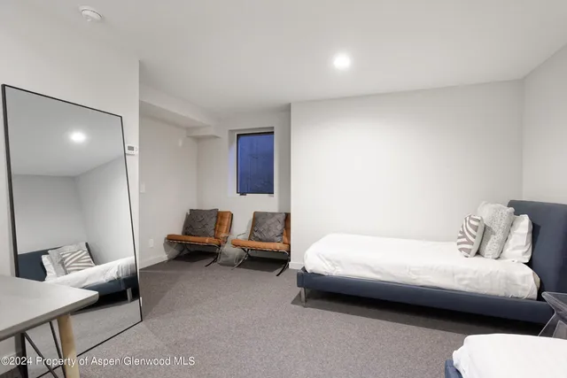 a room with furniture and a wooden floor