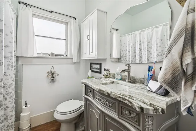 a swimming pool with outdoor seating and yard