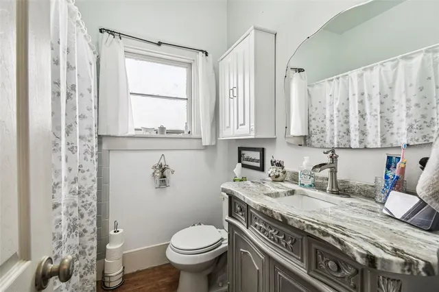 a view of a house with a yard patio and swimming pool
