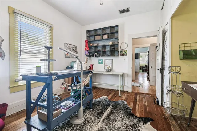 a view of a house with swimming pool and a yard