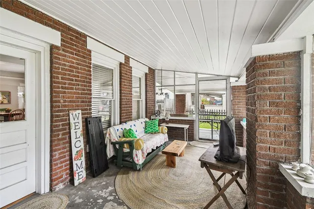 an aerial view of residential building and lake
