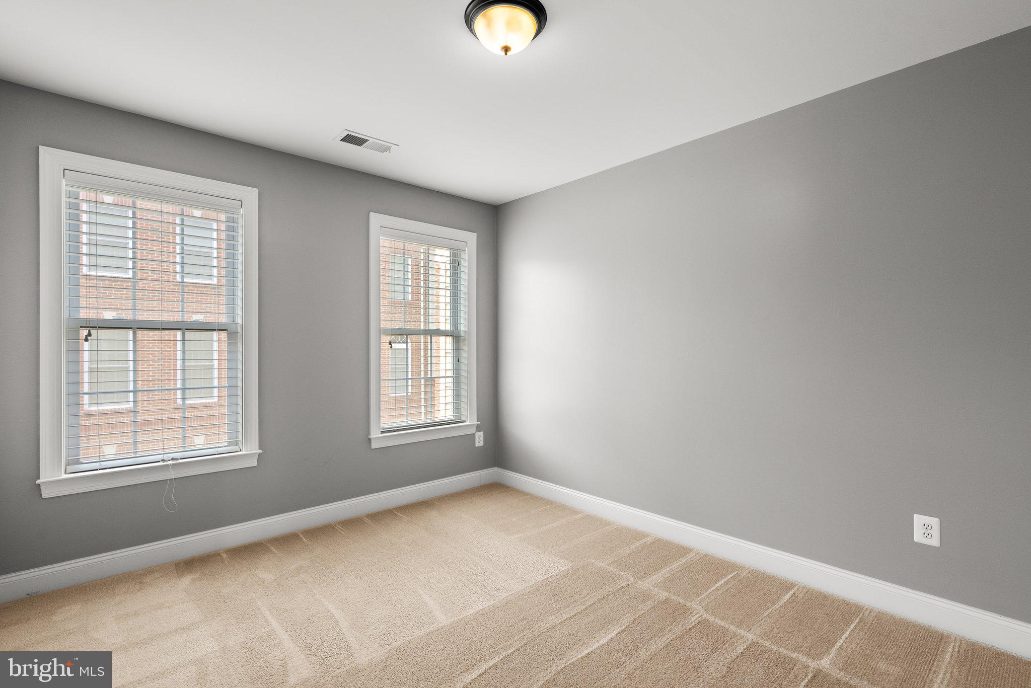 2501 Cherry Tree Road Hanover, MD 21076 - Photo 19 of 30 an empty room with windows and