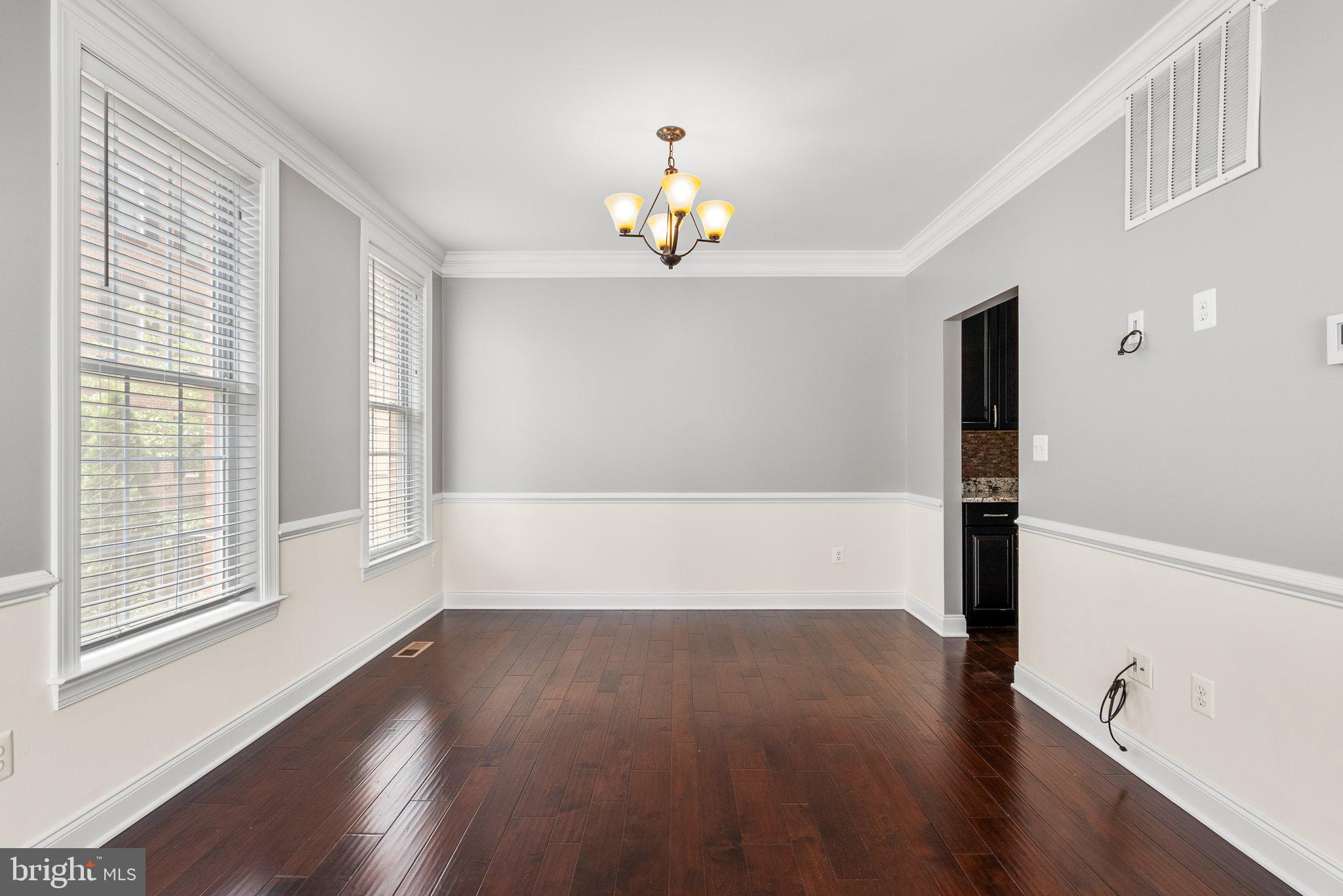 2501 Cherry Tree Road Hanover, MD 21076 - Photo 5 of 30 wooden floor in an empty room with a window