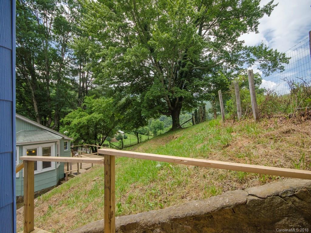 7706 Cruso Road Canton, NC 28716 - Photo 22 of 22 a view of a balcony with an outdoor space