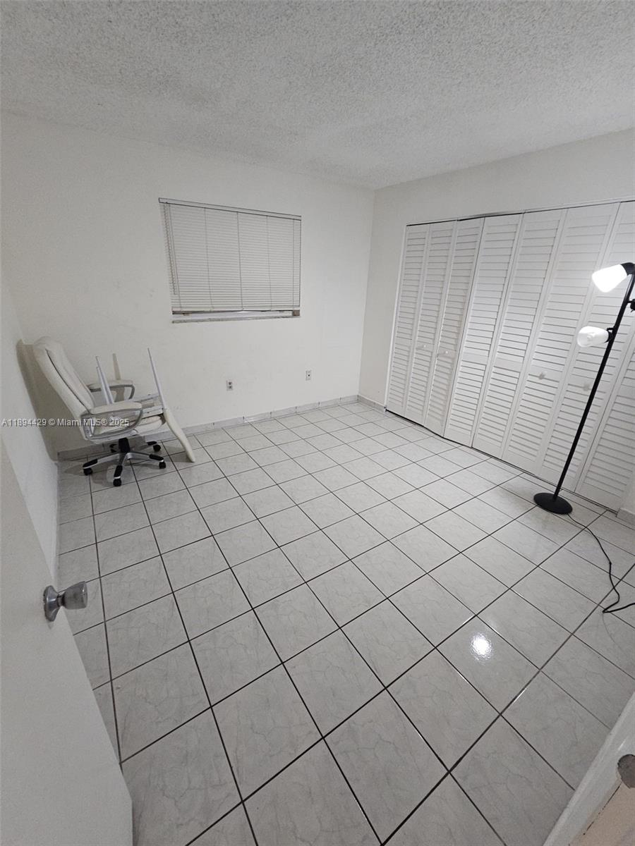 1555 West 44th Place, Unit 221B Hialeah, FL 33012 - Photo 13 of 15 a view of empty room