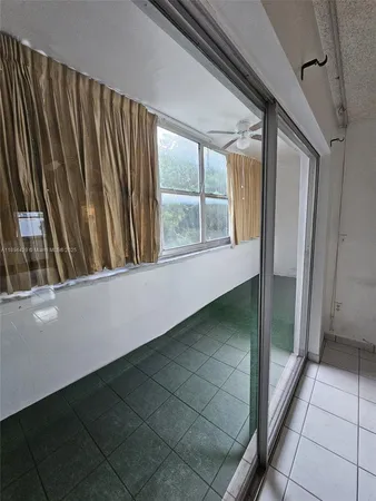a view of storage and utility room with washer and dryer