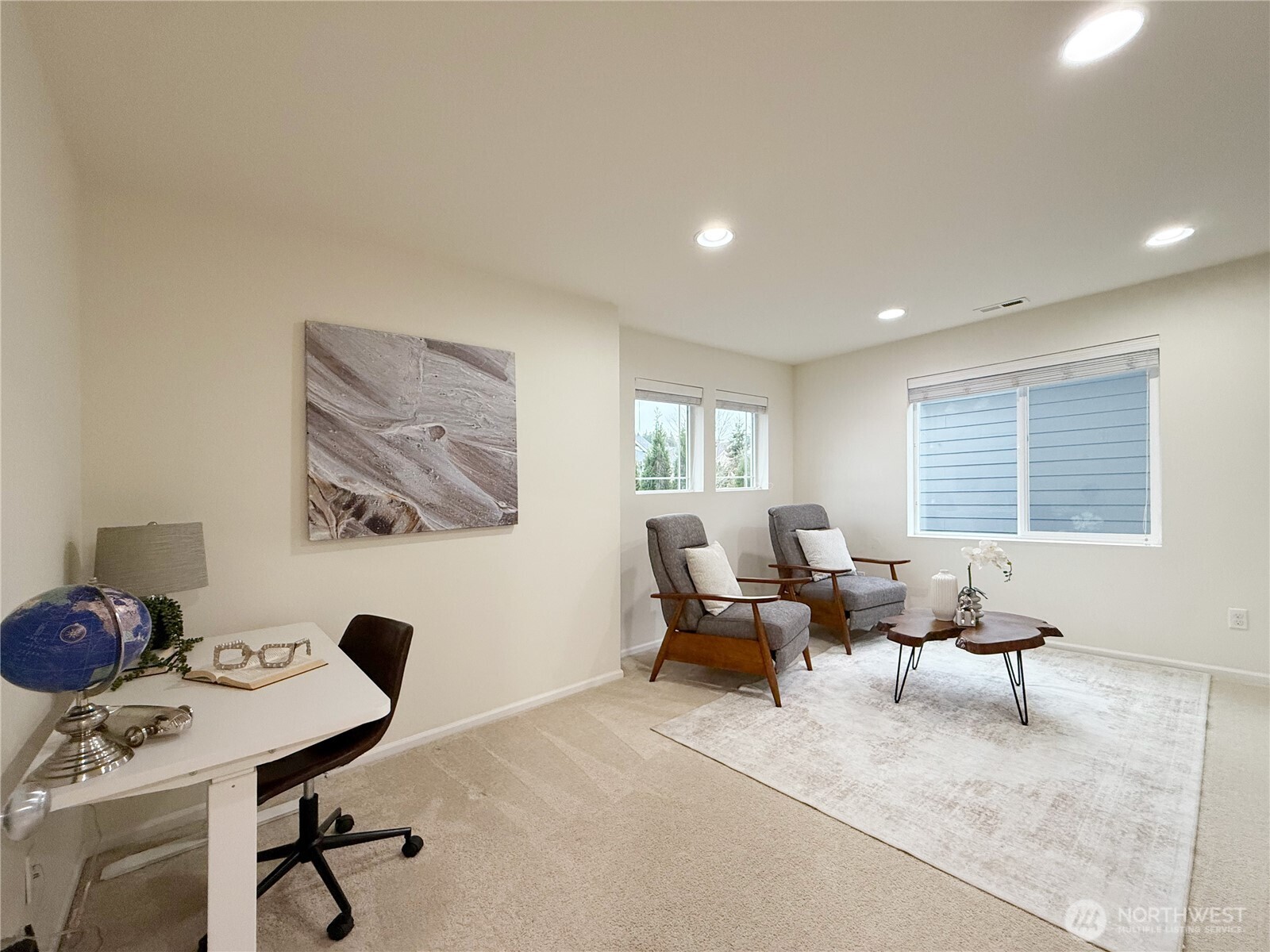 3918 177th Street Southeast Bothell, WA 98012 - Photo 25 of 39 a living room with furniture and a window