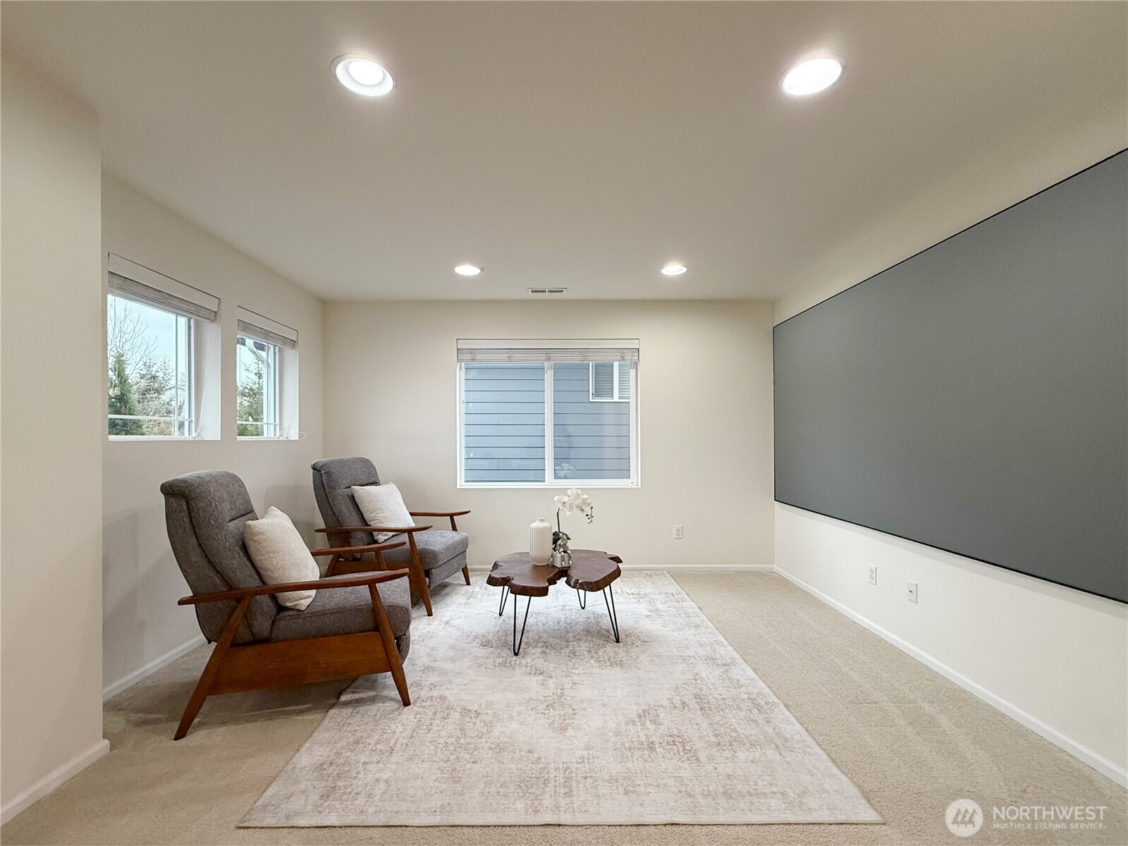 3918 177th Street Southeast Bothell, WA 98012 - Photo 28 of 39 a living room with furniture and window