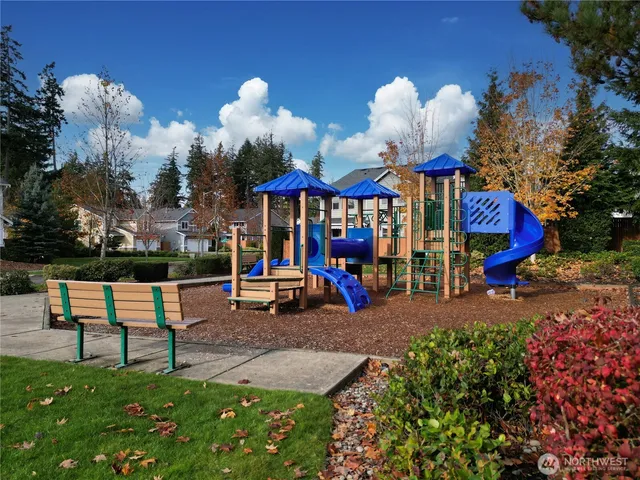 aerial view of a fireplace with sitting area