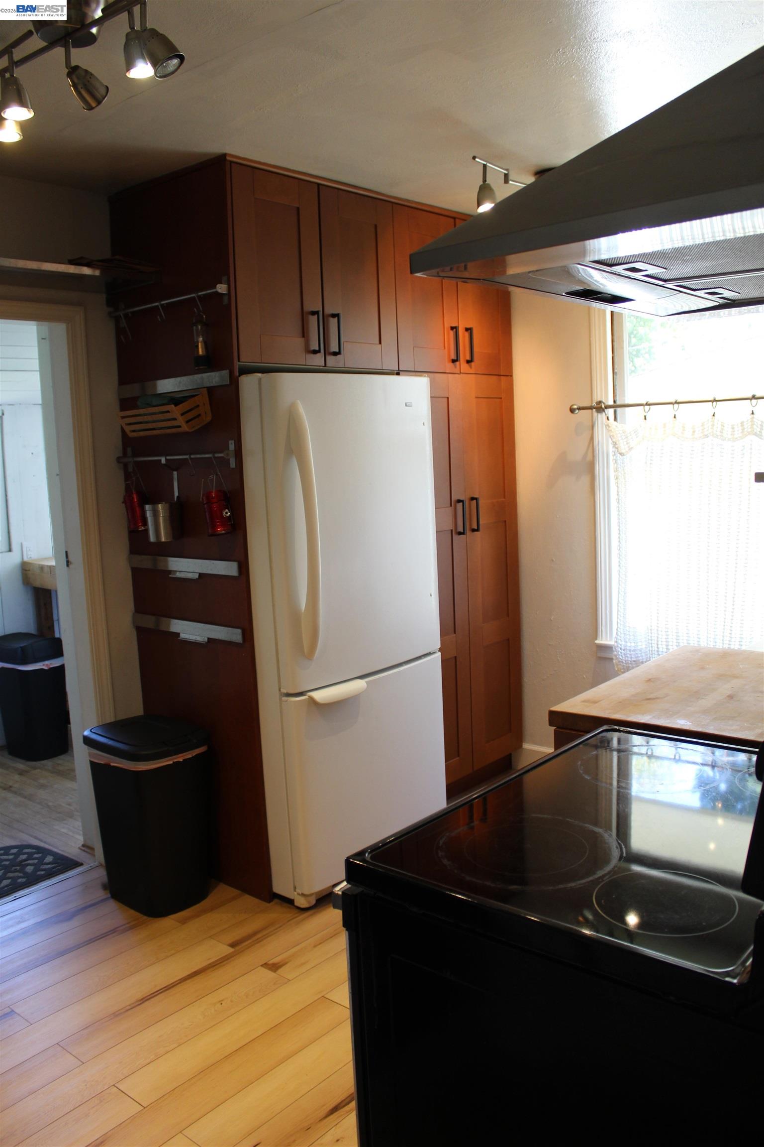 536 Williams Street Murphys, CA 95247 - Photo 17 of 24 a white refrigerator freezer sitting in a kitchen