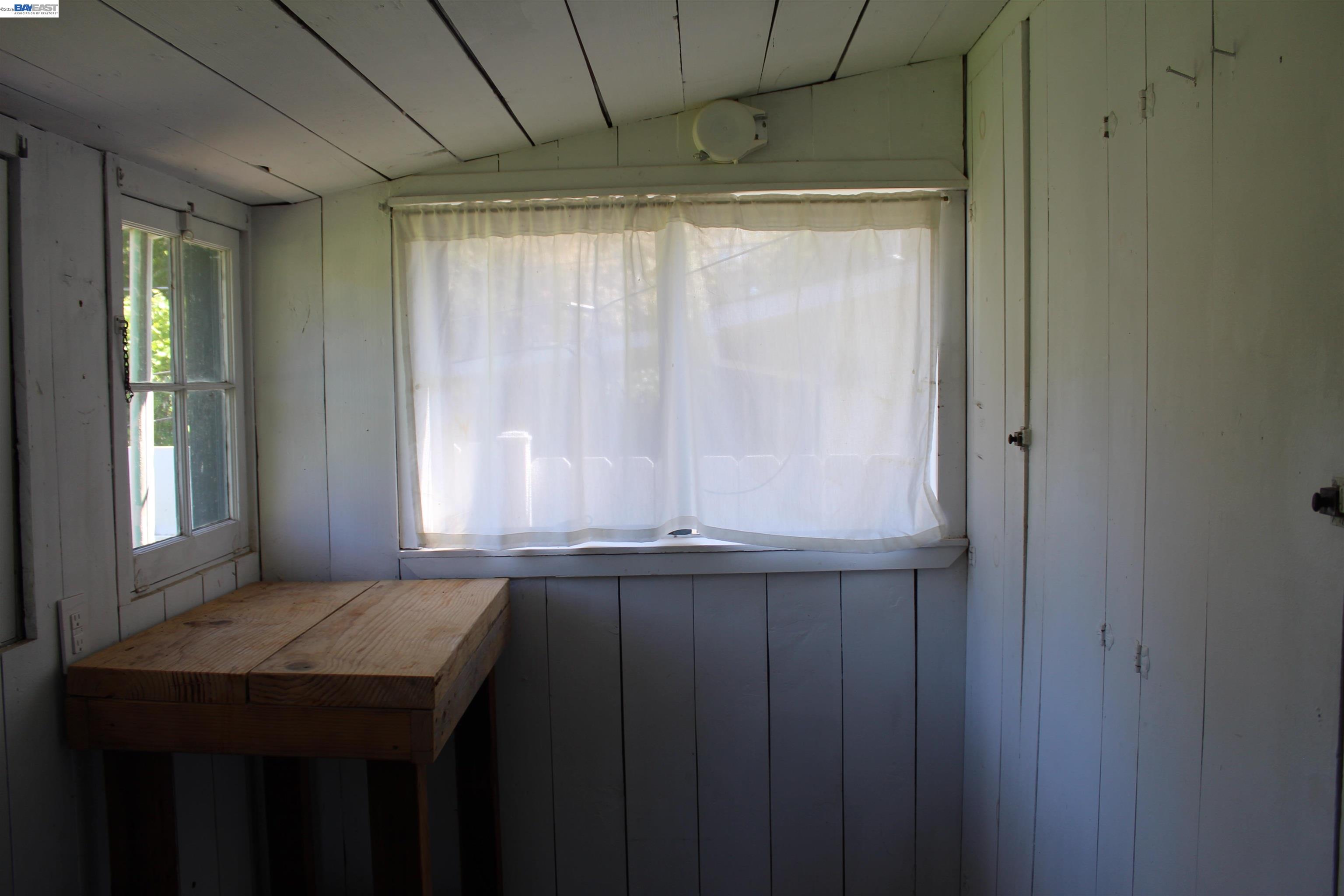536 Williams Street Murphys, CA 95247 - Photo 18 of 24 a bathroom with a granite countertop sink and a window