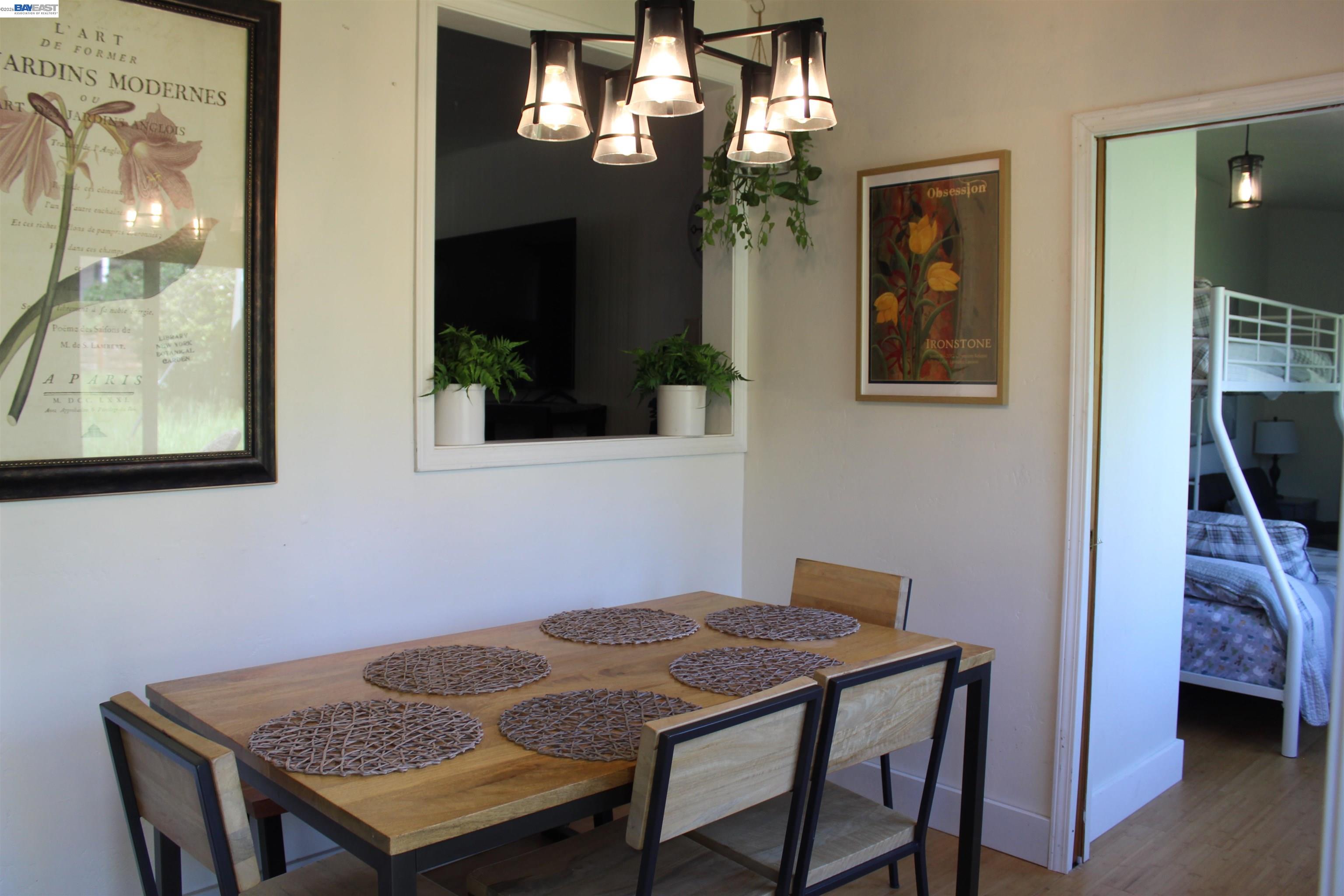 536 Williams Street Murphys, CA 95247 - Photo 7 of 24 a dining room with a table and chairs