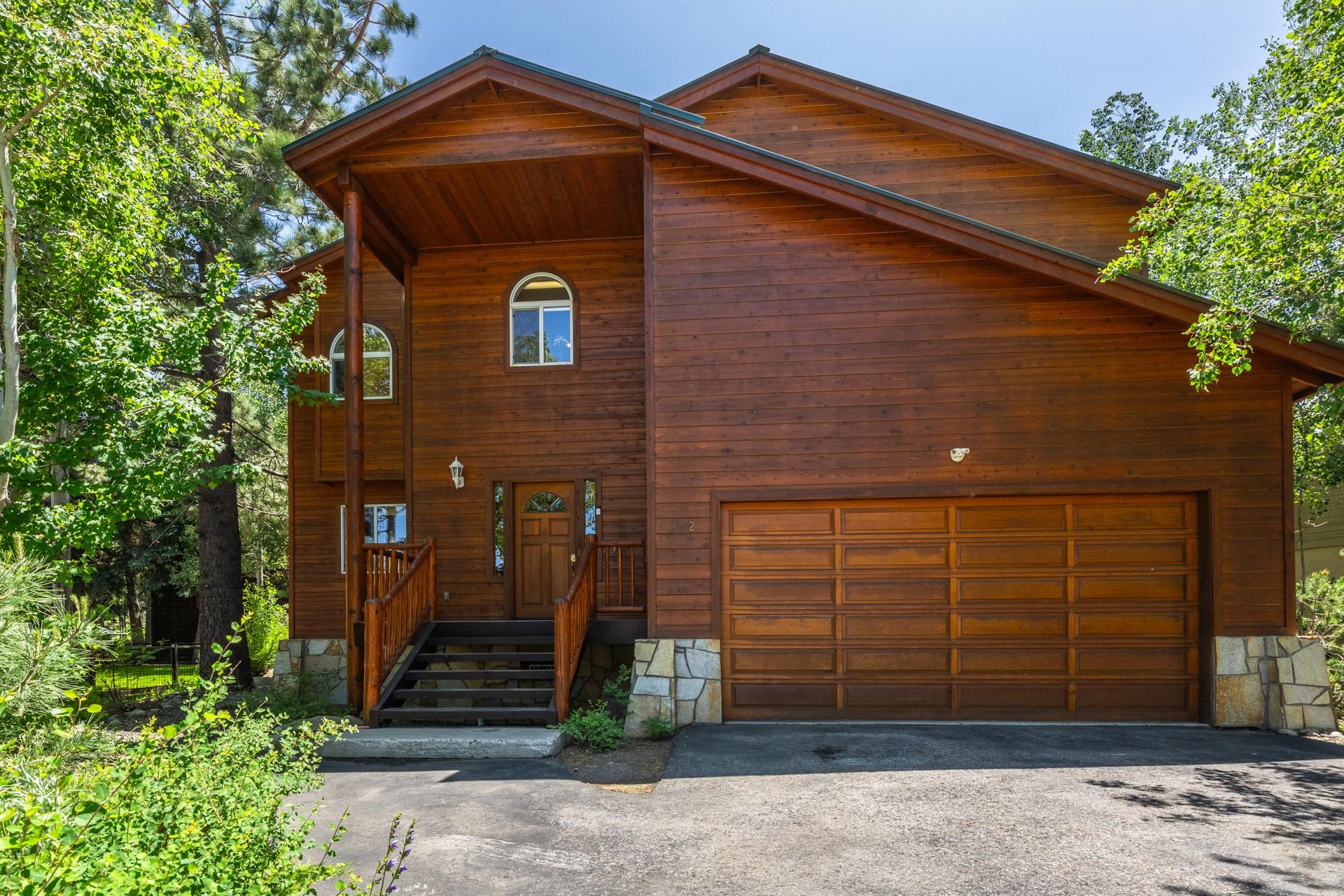 372 Wagon Wheel Road Mammoth Lakes, CA 93546 - Photo 1 of 50 a front view of a house with garden