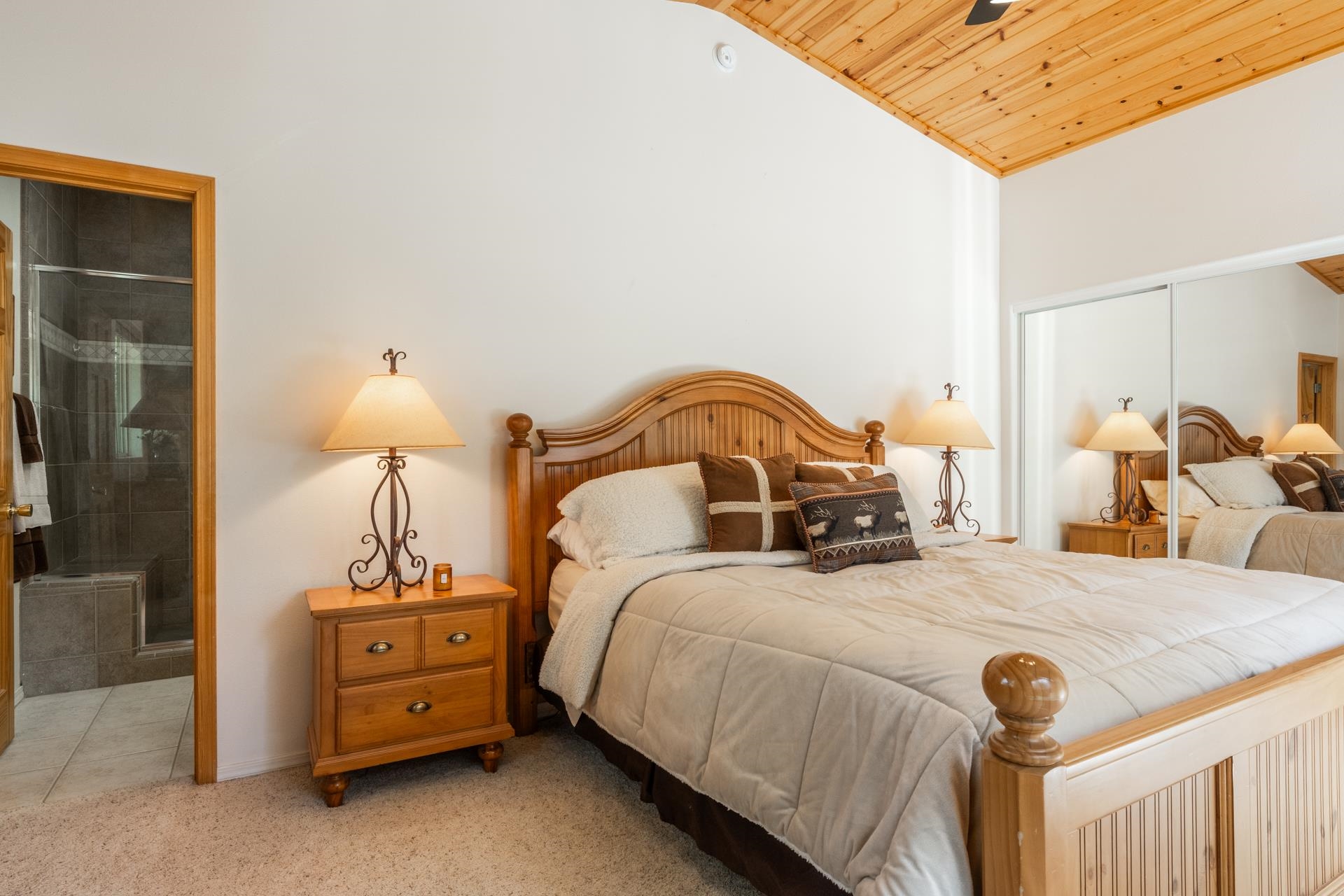 372 Wagon Wheel Road Mammoth Lakes, CA 93546 - Photo 18 of 50 a bedroom with a bed and a night stand next to a window