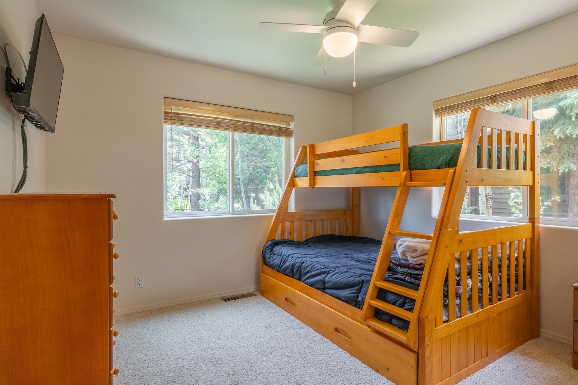 372 Wagon Wheel Road Mammoth Lakes, CA 93546 - Photo 31 of 50 a room with window and a flat screen tv