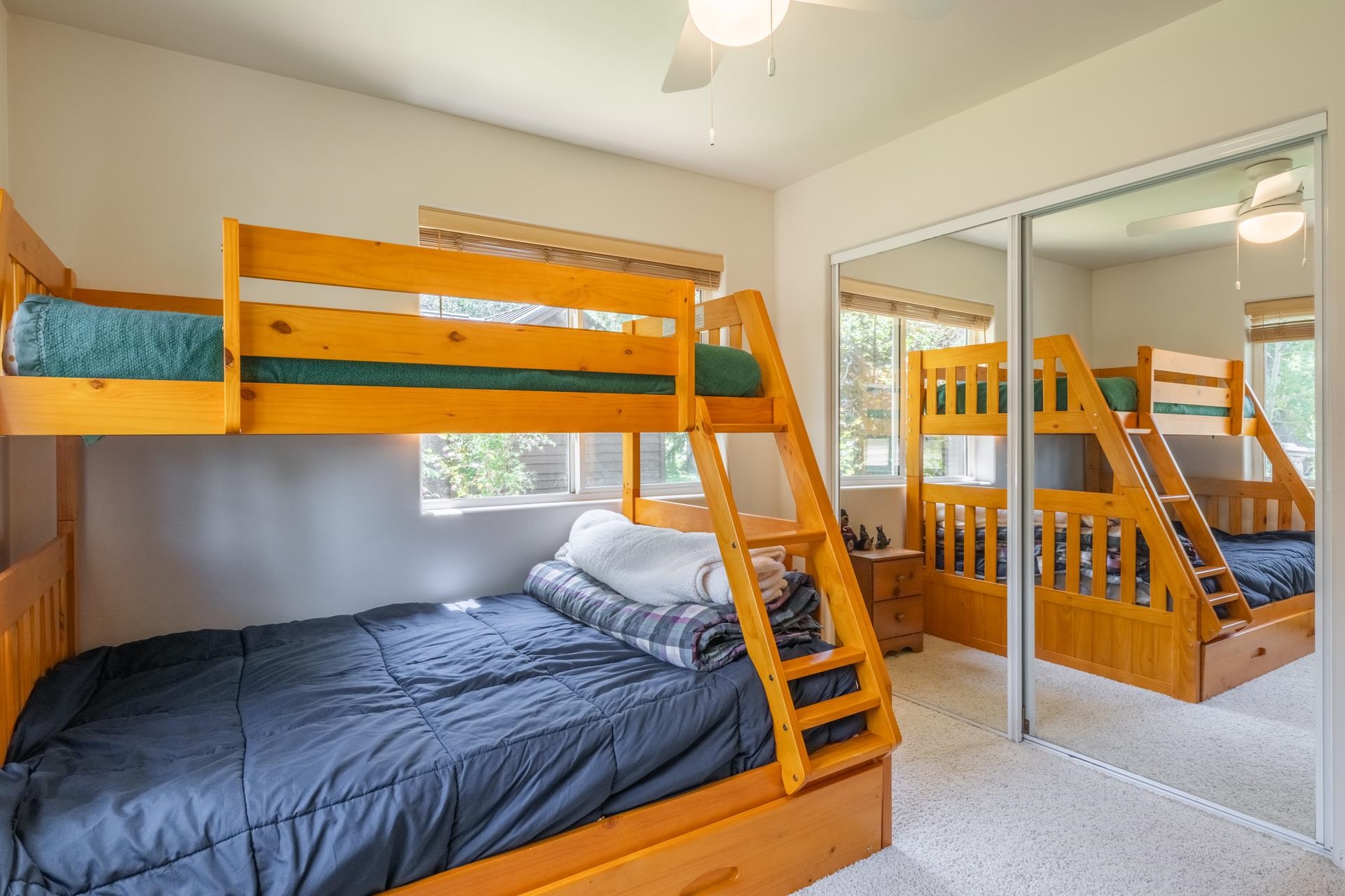 372 Wagon Wheel Road Mammoth Lakes, CA 93546 - Photo 32 of 50 a bedroom with a bed and wooden floor