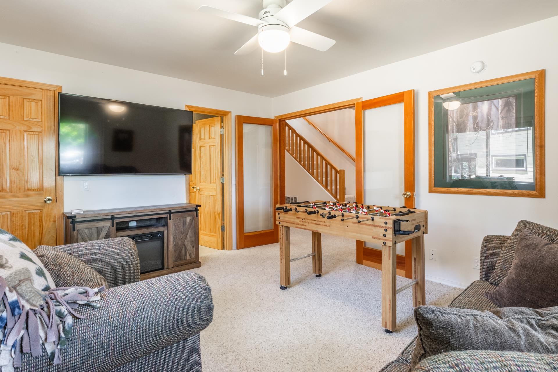 372 Wagon Wheel Road Mammoth Lakes, CA 93546 - Photo 38 of 50 a living room with furniture and a flat screen tv