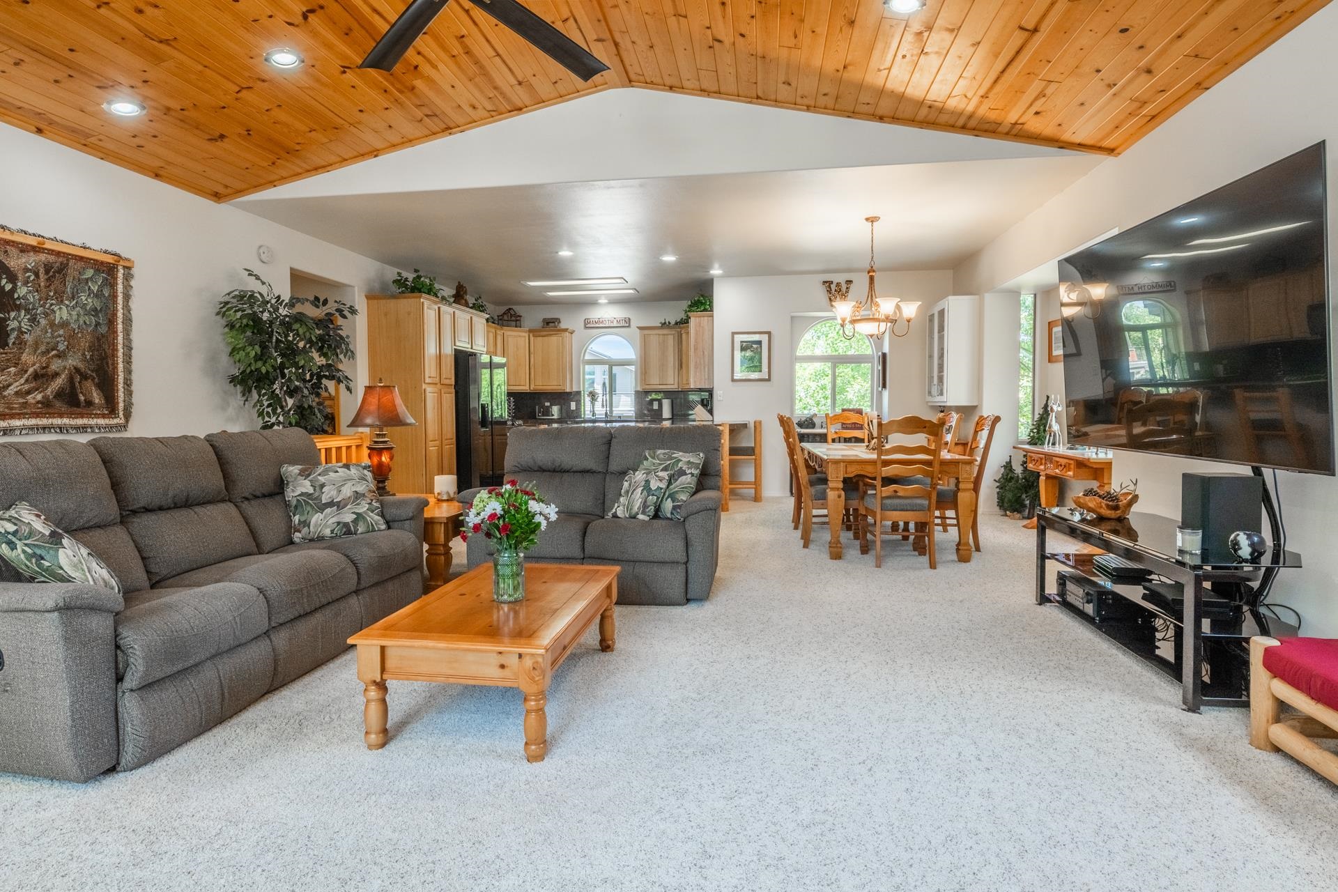 372 Wagon Wheel Road Mammoth Lakes, CA 93546 - Photo 6 of 50 a living room with furniture and a flat screen tv