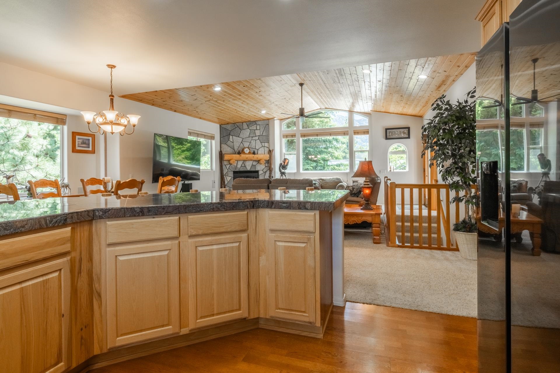 372 Wagon Wheel Road Mammoth Lakes, CA 93546 - Photo 8 of 50 a kitchen with stainless steel appliances granite countertop a stove a sink and a refrigerator