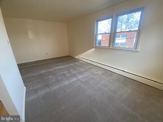 136 Susquehanna Avenue, Unit C Lansdale, PA 19446 - Photo 3 of 8 an empty room with windows
