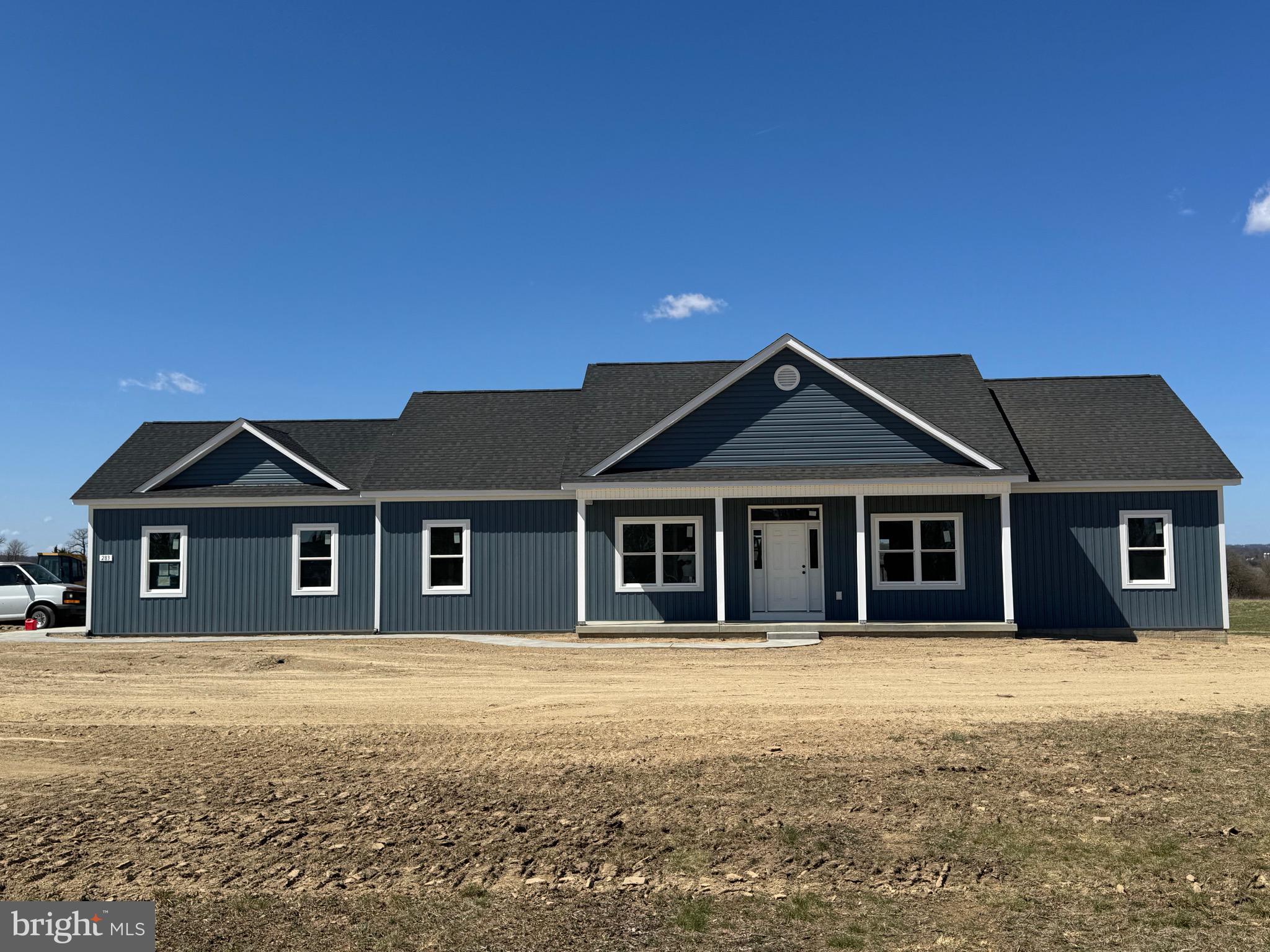 309 Gun Club Road Stephenson, VA 22656 - Photo 1 of 41 a front view of a house with a yard