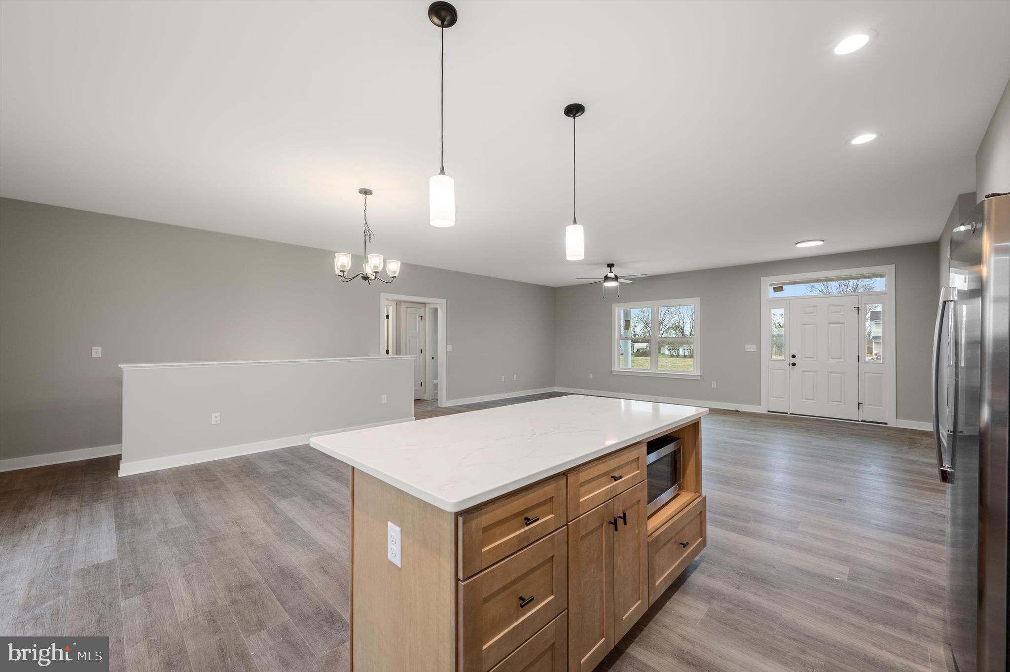 309 Gun Club Road Stephenson, VA 22656 - Photo 15 of 41 a kitchen that has a lot of cabinets and wooden floor