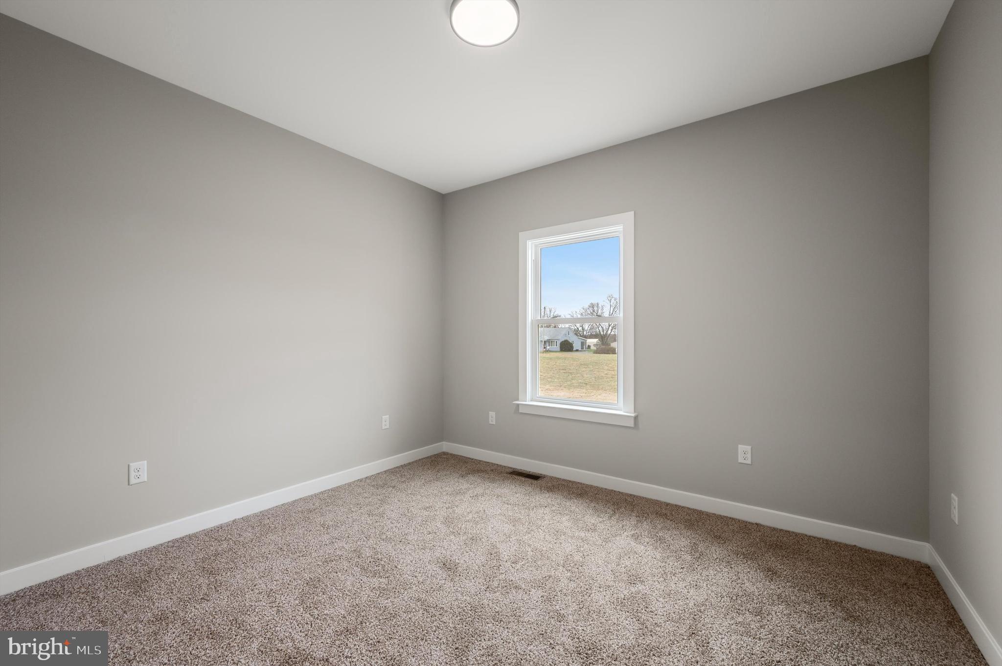 309 Gun Club Road Stephenson, VA 22656 - Photo 16 of 41 an empty room with a window