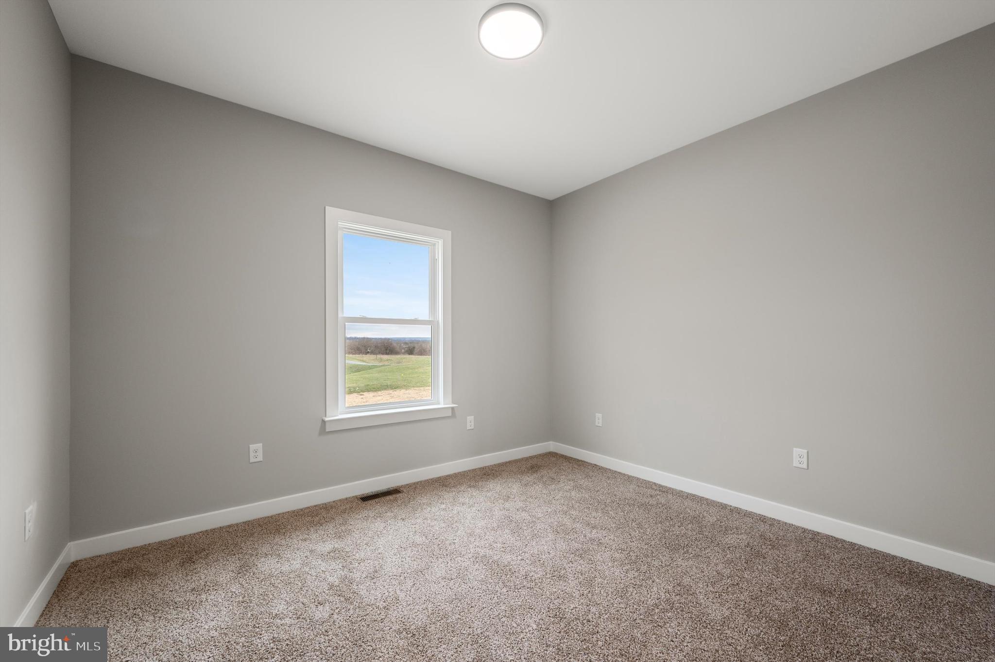 309 Gun Club Road Stephenson, VA 22656 - Photo 19 of 41 an empty room with a window