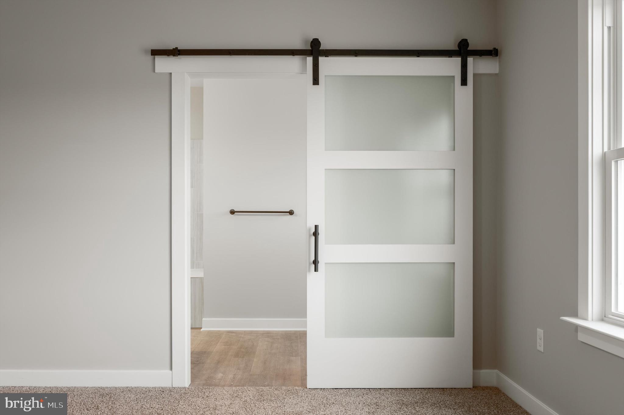 309 Gun Club Road Stephenson, VA 22656 - Photo 25 of 41 a bathroom with a glass shower door