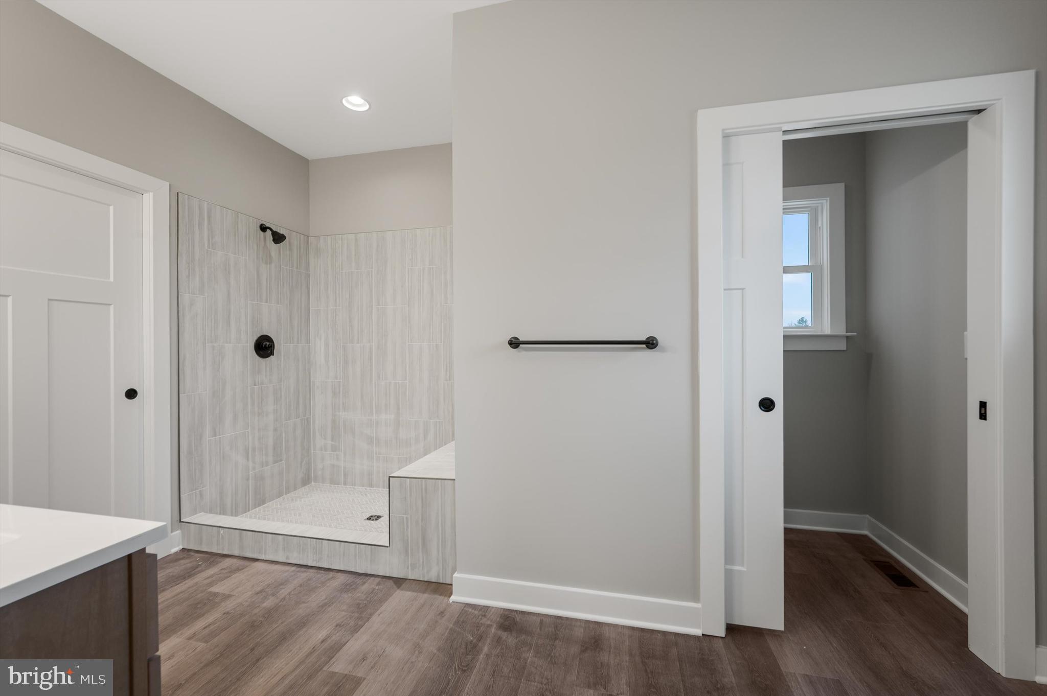309 Gun Club Road Stephenson, VA 22656 - Photo 26 of 41 a view of an empty room with wooden floor