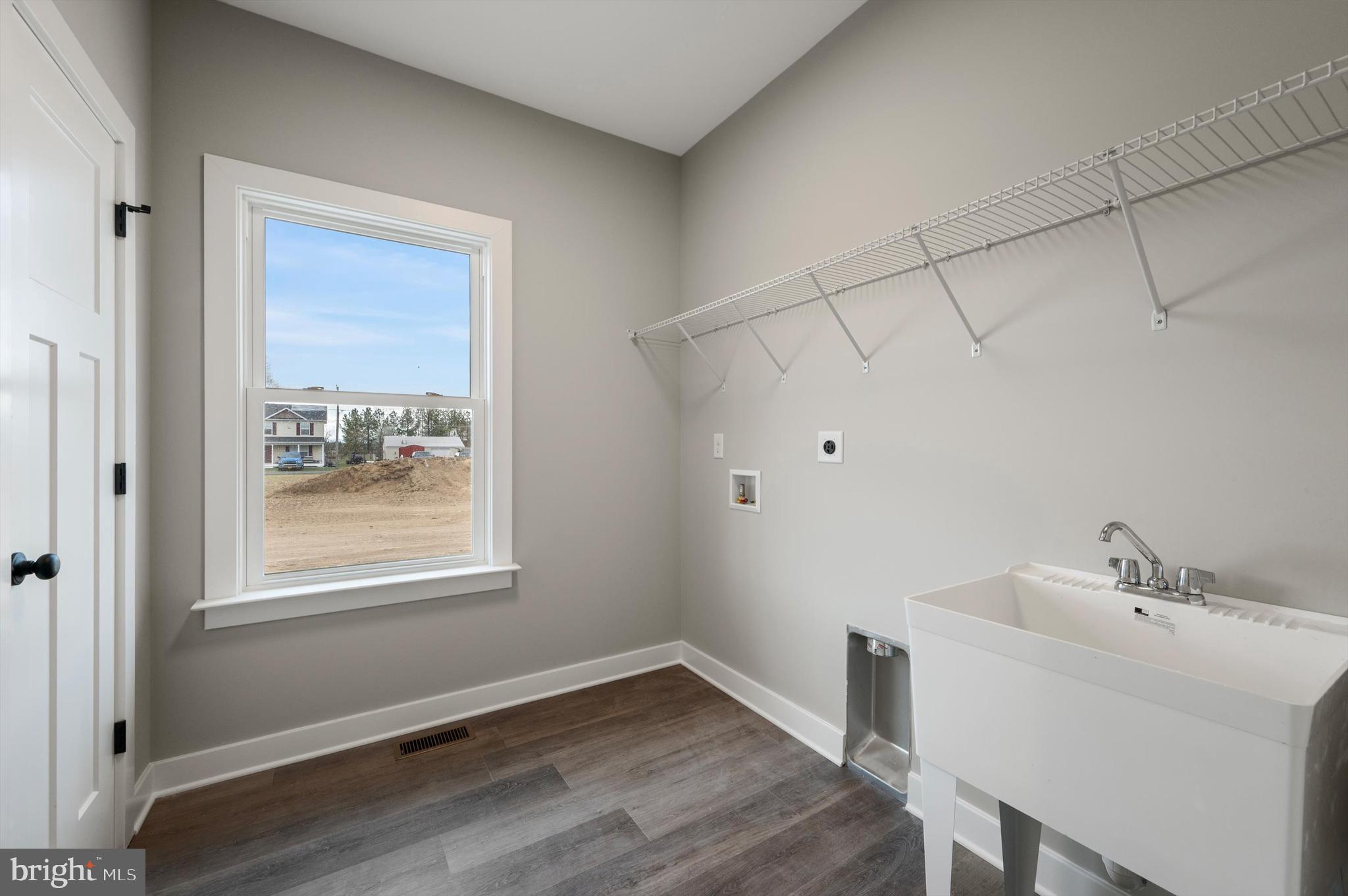 309 Gun Club Road Stephenson, VA 22656 - Photo 34 of 41 a bathroom with a sink and a window