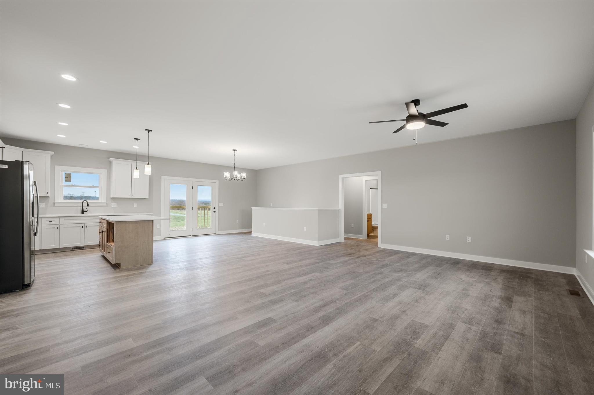 309 Gun Club Road Stephenson, VA 22656 - Photo 5 of 41 a view of an empty room with a window