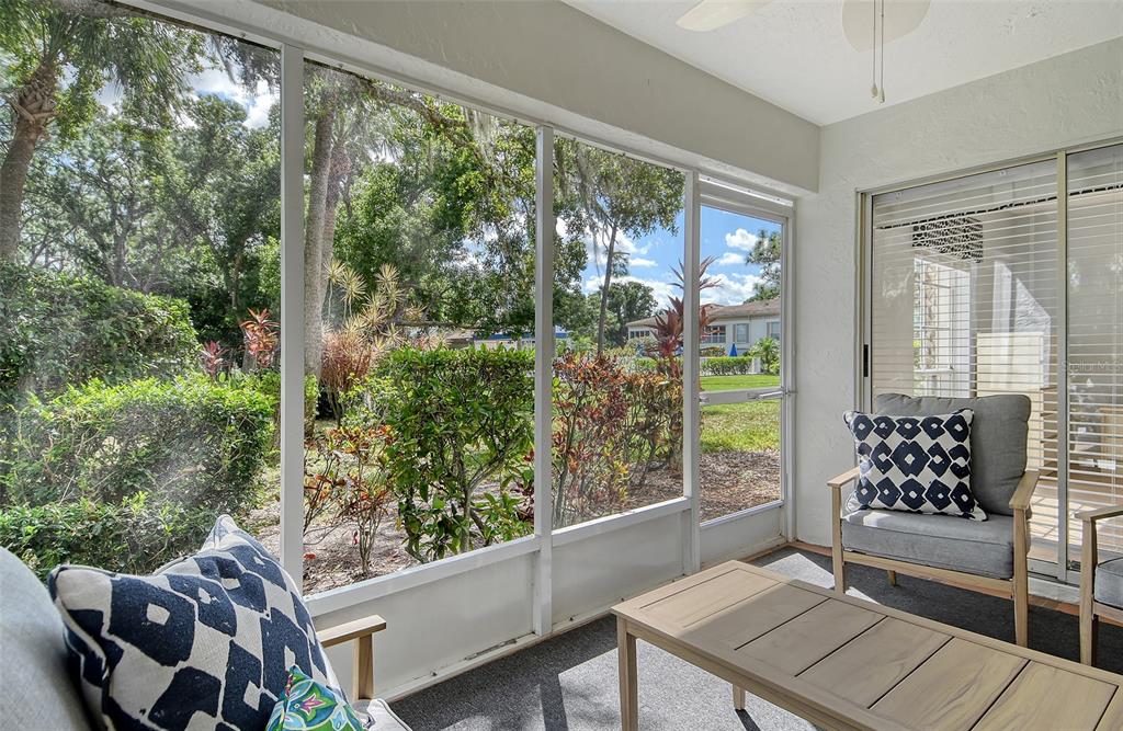 5246 Marsh Field Lane, Unit 1 Sarasota, FL 34235 - Photo 31 of 49 a view of a two chairs in the balcony