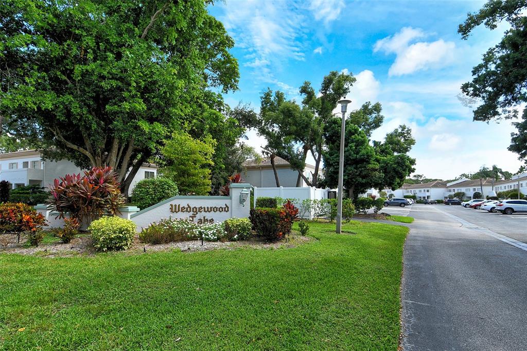 5246 Marsh Field Lane, Unit 1 Sarasota, FL 34235 - Photo 41 of 49 a view of a backyard with sitting area