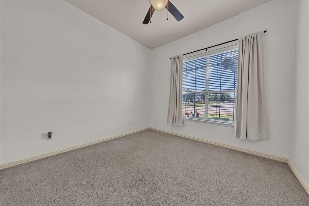 437 Rusty Run Drive Midlothian, TX 76065 - Photo 17 of 40 an empty room with chandelier fan