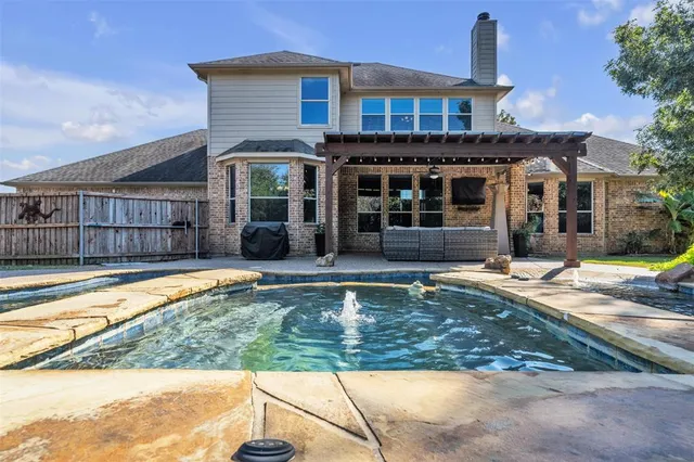 a view of a house with swimming pool