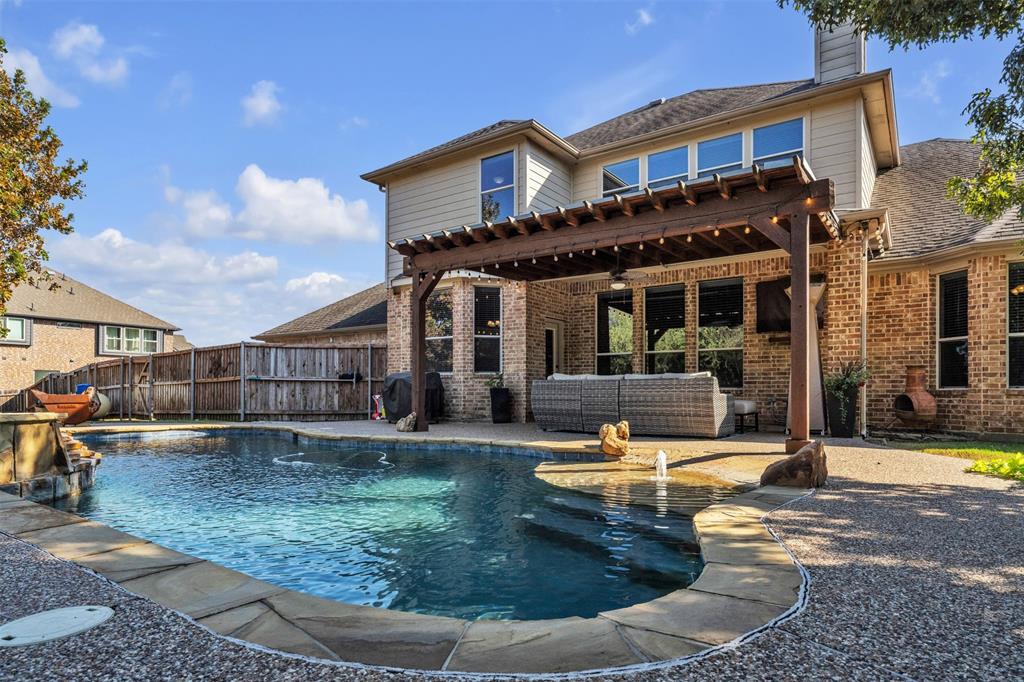 437 Rusty Run Drive Midlothian, TX 76065 - Photo 39 of 40 a view of a house with swimming pool and sitting area