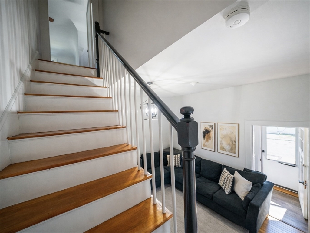 10 Guild Road Saugus, MA 01906 - Photo 7 of 32 a view of entryway and hall with wooden floor