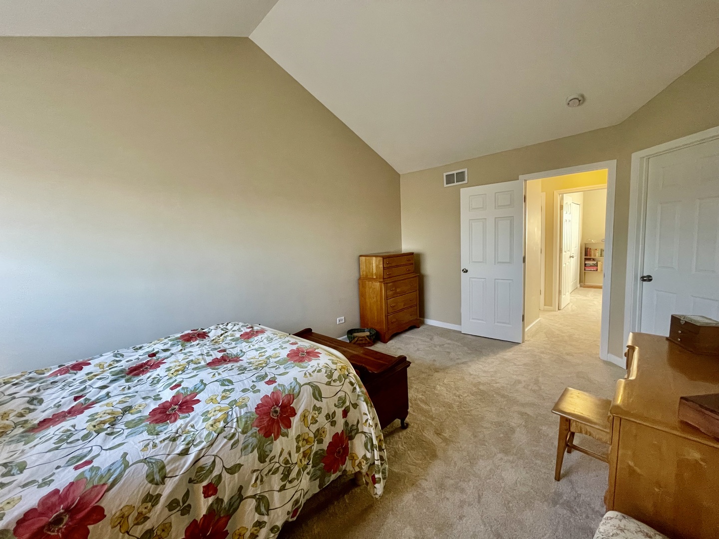 34718 Lakeside Drive Ingleside, IL 60041 - Photo 22 of 34 a bedroom with a bed and wooden floor