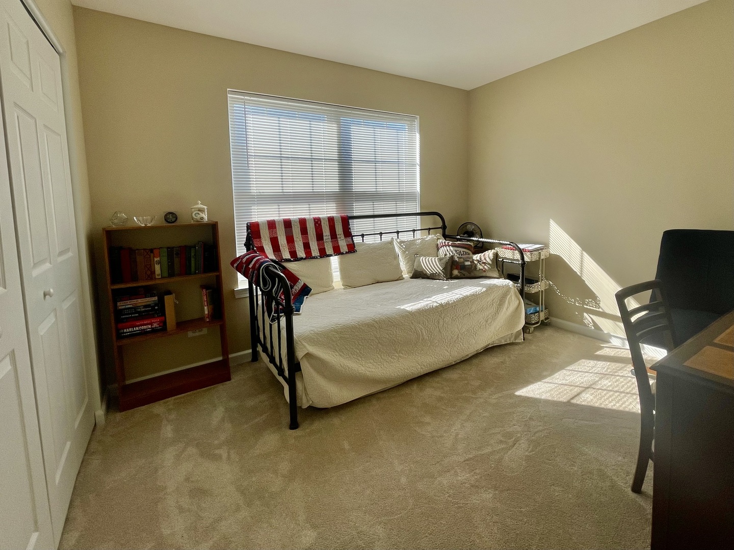 34718 Lakeside Drive Ingleside, IL 60041 - Photo 28 of 34 a living room with a bed furniture and a window