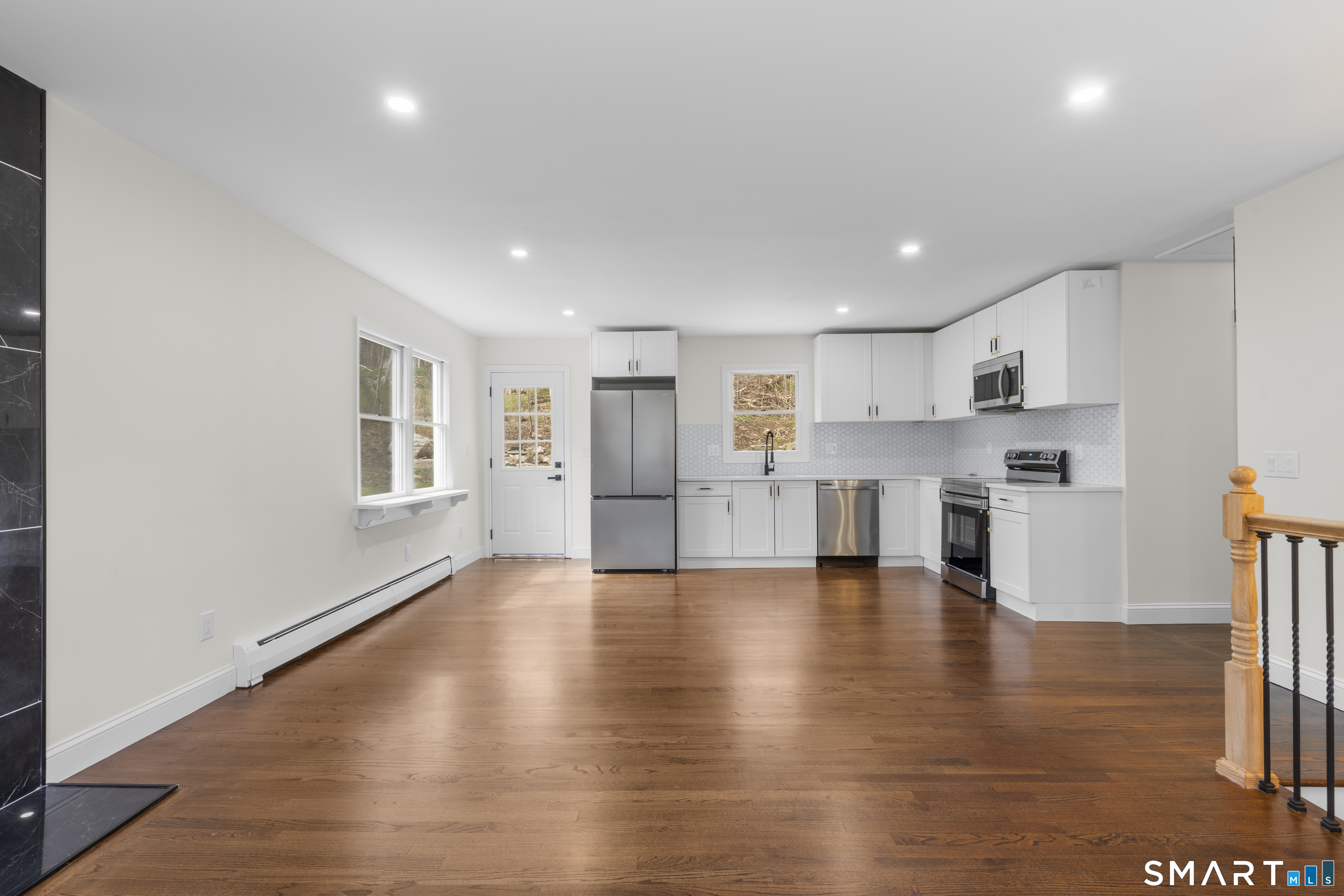 70 Dayton Road Redding, CT 06896 - Photo 6 of 38 a view of kitchen with furniture and wooden floor
