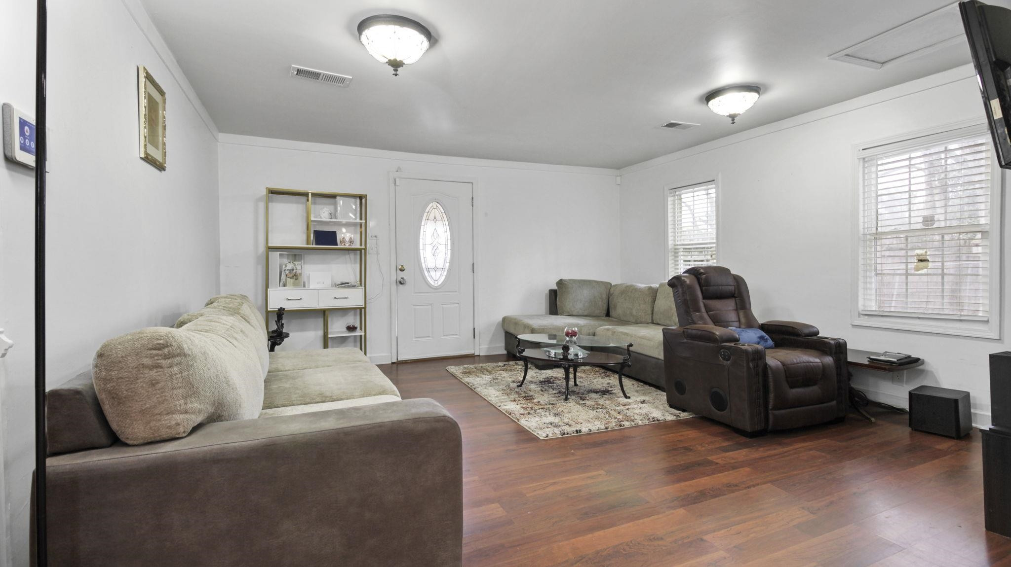 103 St Matthews Road Erwin, NC 28339 - Photo 2 of 14 a living room with furniture and a window