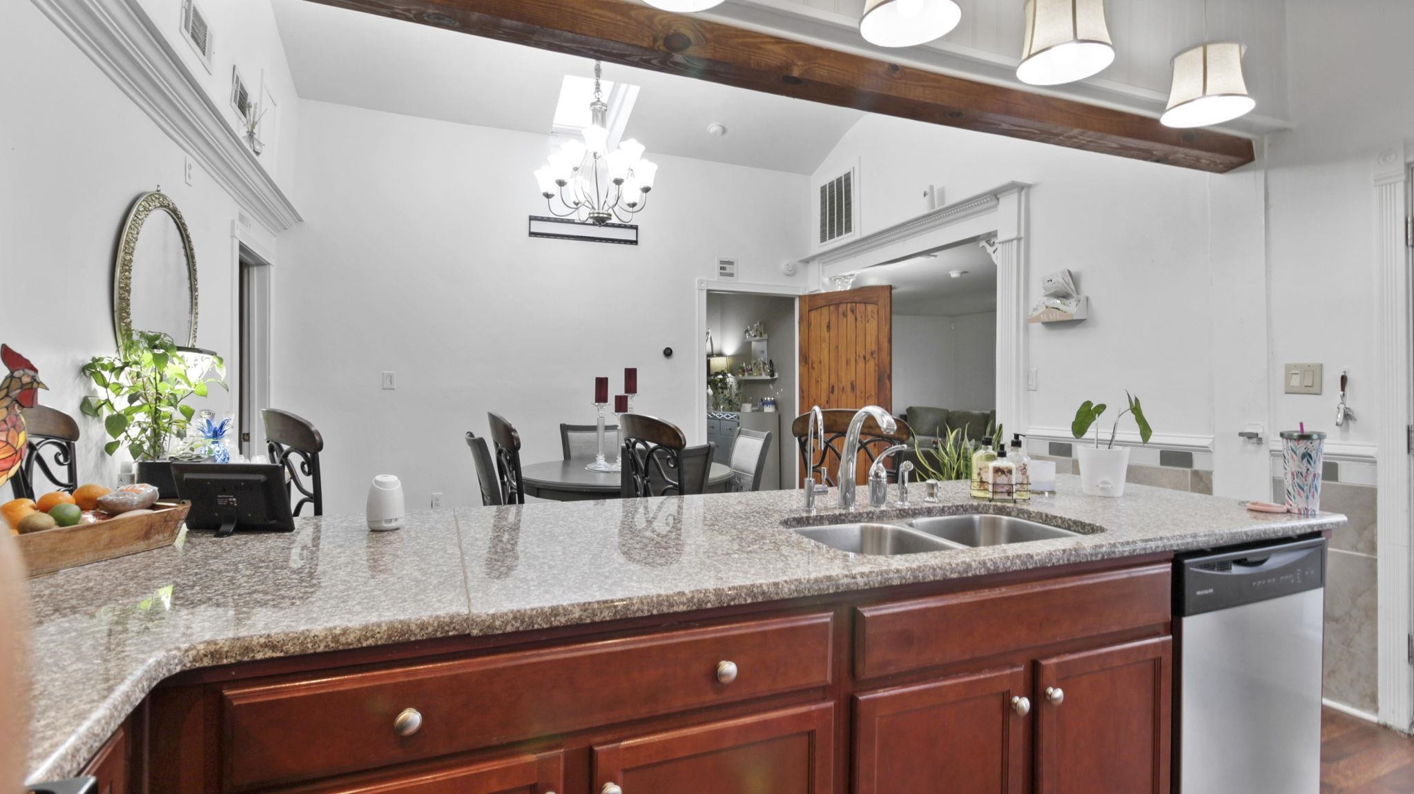 103 St Matthews Road Erwin, NC 28339 - Photo 3 of 14 a bathroom with a granite countertop double vanity and a mirror