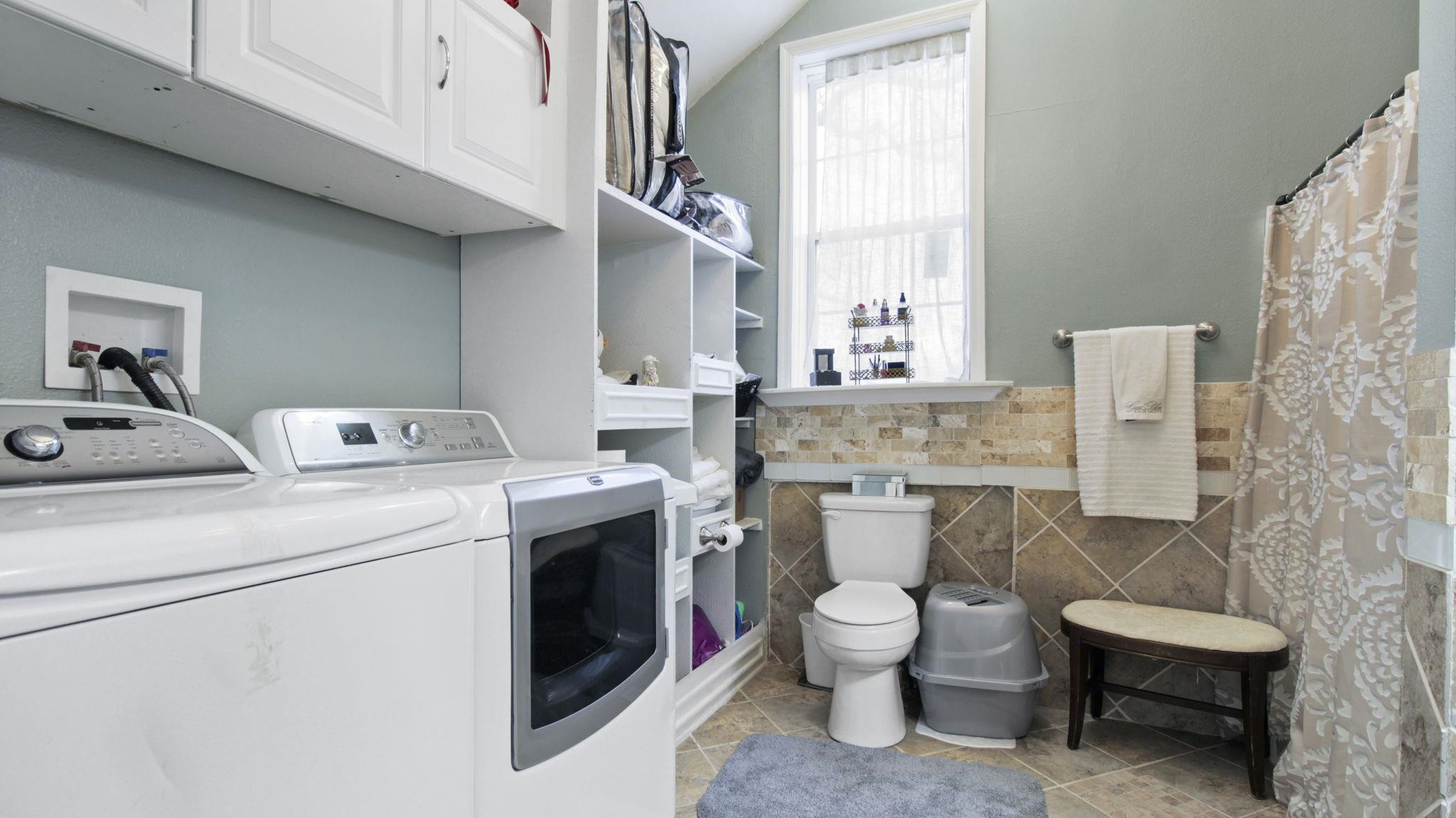 103 St Matthews Road Erwin, NC 28339 - Photo 8 of 14 a utility room with dryer and washer