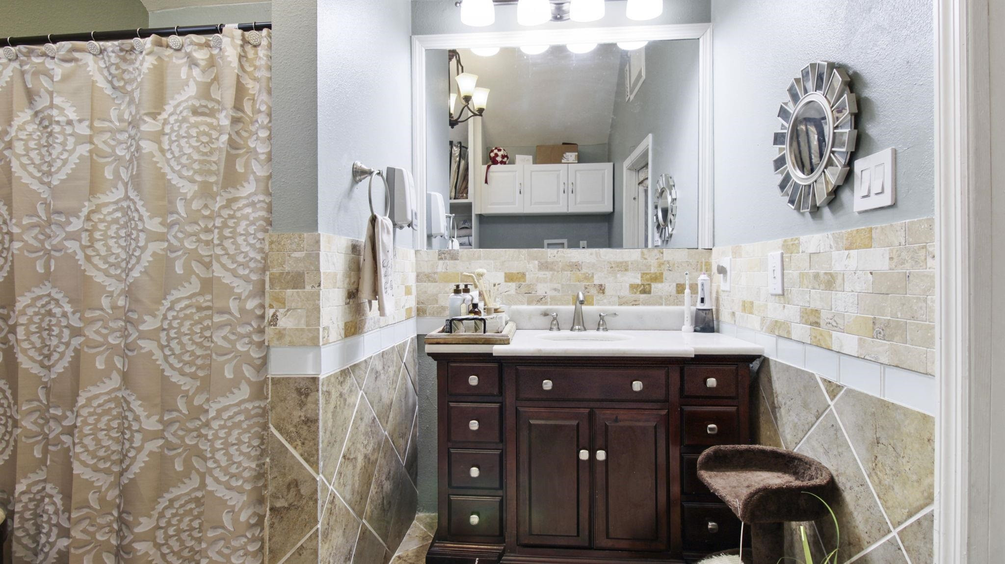 103 St Matthews Road Erwin, NC 28339 - Photo 9 of 14 a bathroom with a sink and a mirror