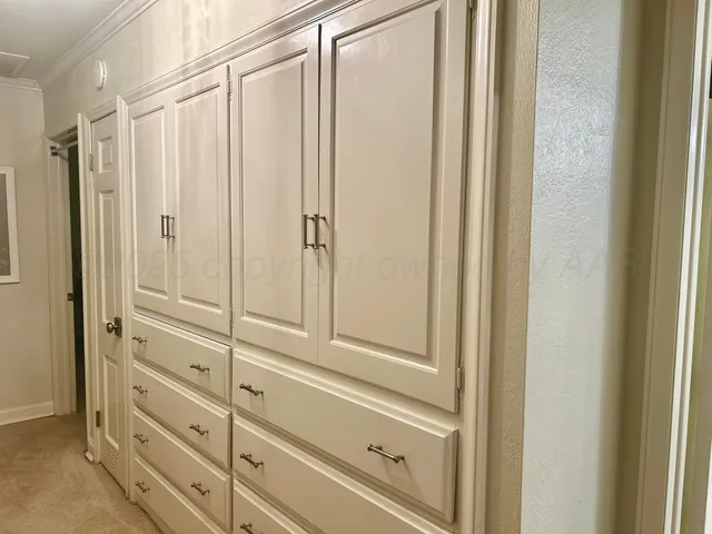 a bathroom with a bathtub and a shower curtain